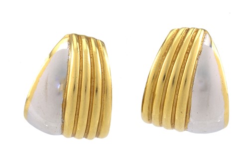 Lot 26 - A pair of two-toned clip post earrings, each...