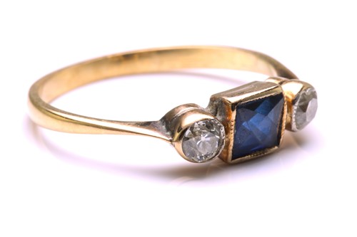 Lot 98 - A sapphire and diamond ring, featuring a...
