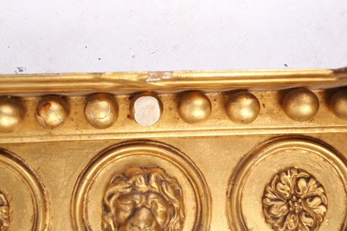 Lot A Regency carved wood and gilt gesso pier...