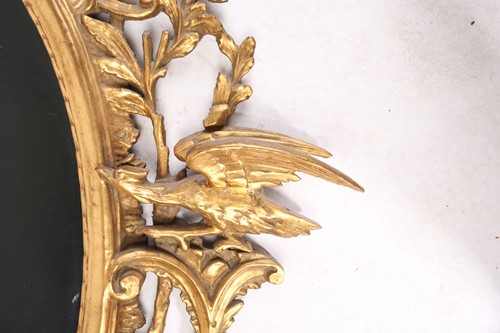 Lot An 18th-century style carved wood and gilt...