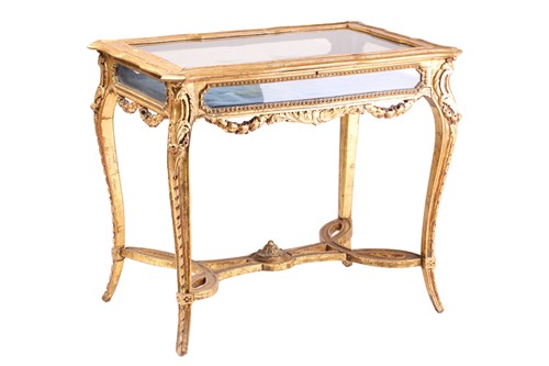 Lot A Louis XV style carved wood and gilt gesso...