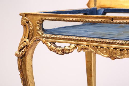 Lot 243 - A Louis XV style carved wood and gilt gesso...