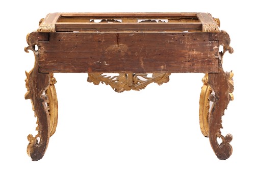 Lot A 17th-century Italian style carved wood and...