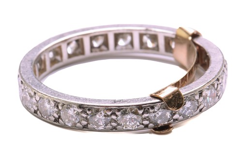 Lot 169 - A diamond eternity ring, comprises an array of...