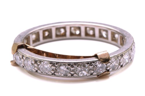 Lot 169 - A diamond eternity ring, comprises an array of...