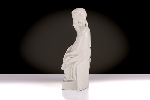 Lot 149 - A Chinese Dehua blanc de chine figure of a...