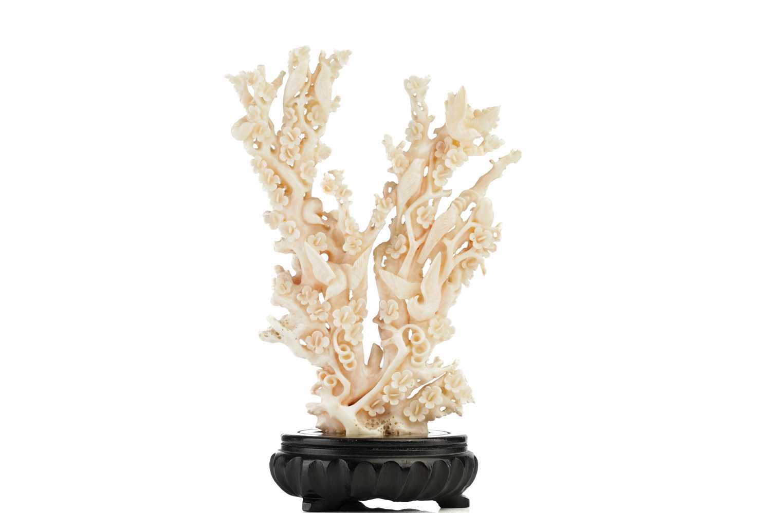 Lot 94 - A Chinese mottled pink/white coral carving in...