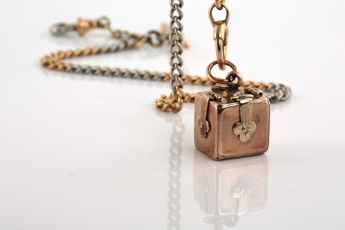 Lot 82 - An 18ct gold Albert chain with Masonic cube...