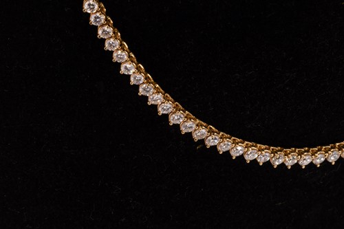 Lot 78 - A diamond rivière necklace, by Greek designer...