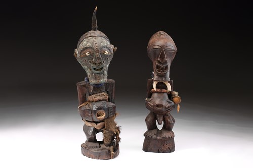 Lot 46 - Two Songye male standing power figures, Nkisi,...