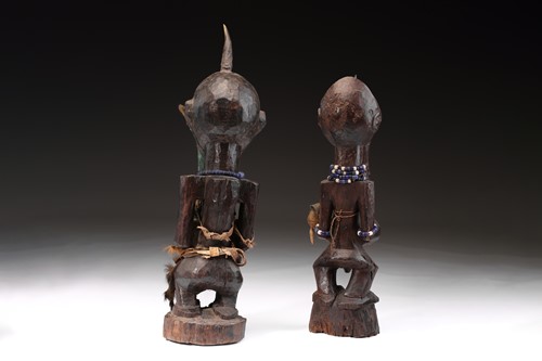 Lot 46 - Two Songye male standing power figures, Nkisi,...