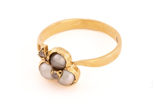 Lot 69 - A pearl and diamond three-leaf clover ring,...