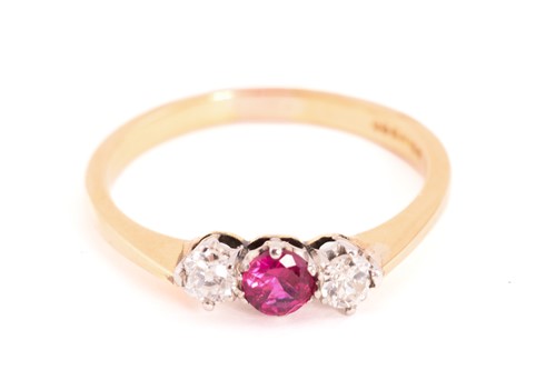Lot 119 - A ruby and diamond three-stone ring in 18ct...