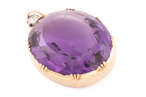 Lot 4 - A large amethyst and diamond pendant,...