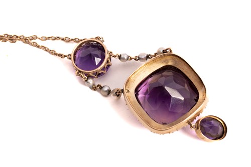 Lot 68 - An amethyst and seed pearl lavalier necklace,...