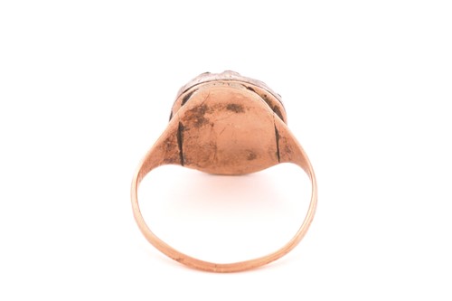 Lot 101 - A diamond-set panel ring, with an oval face...