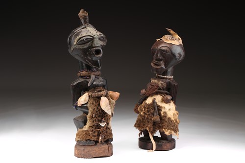Lot 135 - Two Songye standing male power figures,...