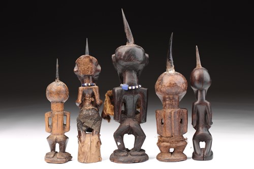 Lot 14 - A group of five Songye power figures, Nikisi,...