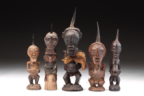 Lot 14 - A group of five Songye power figures, Nikisi,...