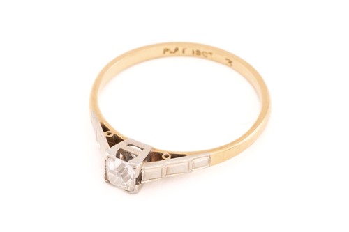 Lot 37 - A diamond solitaire ring, composed of an...