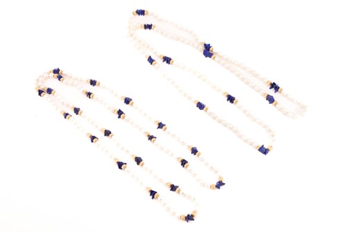 Lot 95 - Two pearl and lapis lazuli endless necklaces;...