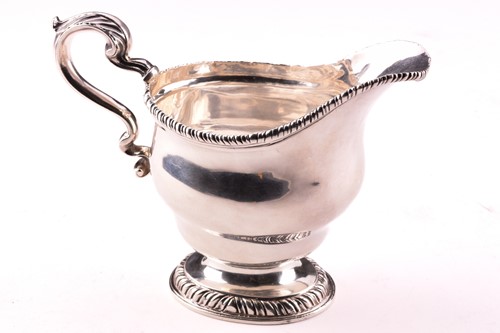 Lot 283 - A pair of George II silver sauce boats, with...