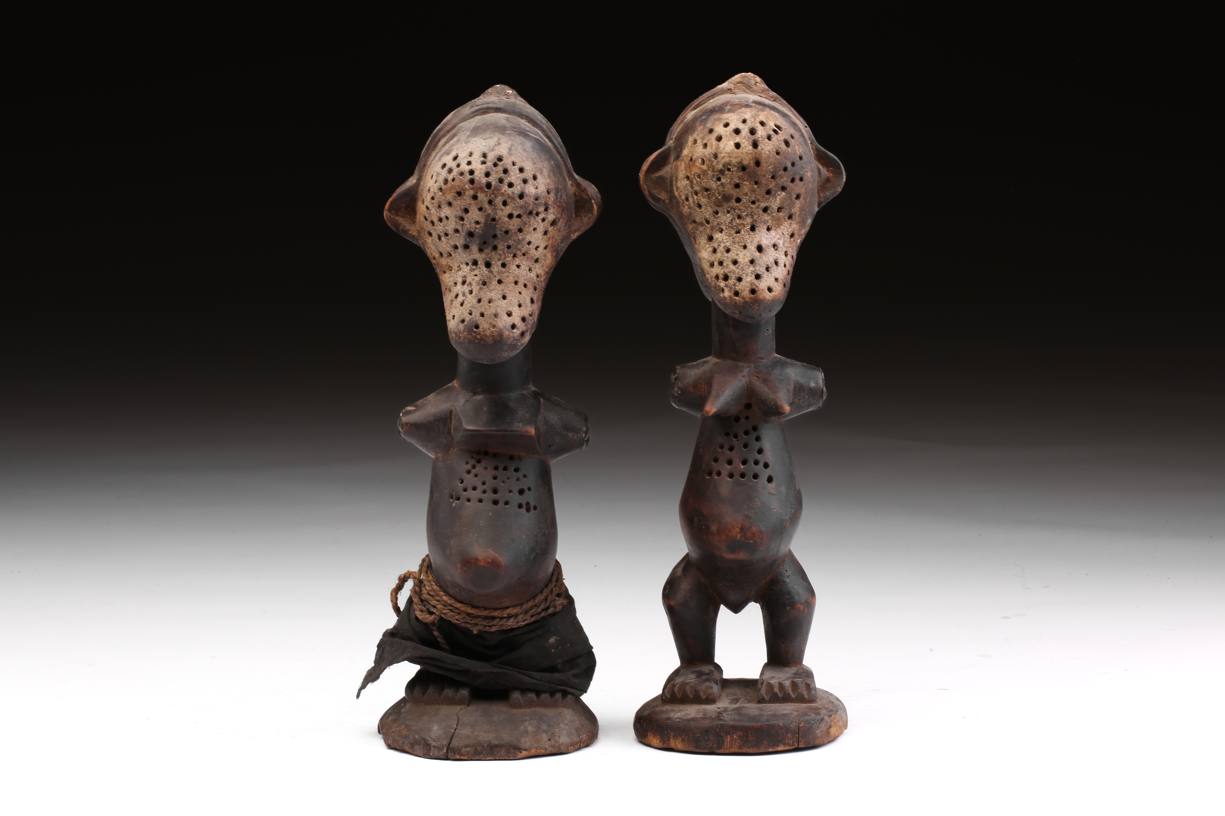Lot 133 - An unusual pair of Janiform female power