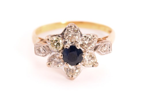 Lot 46 - A sapphire and diamond flower head ring in...