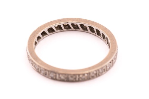 Lot 25 - A diamond eternity ring, fully pavé-set with...