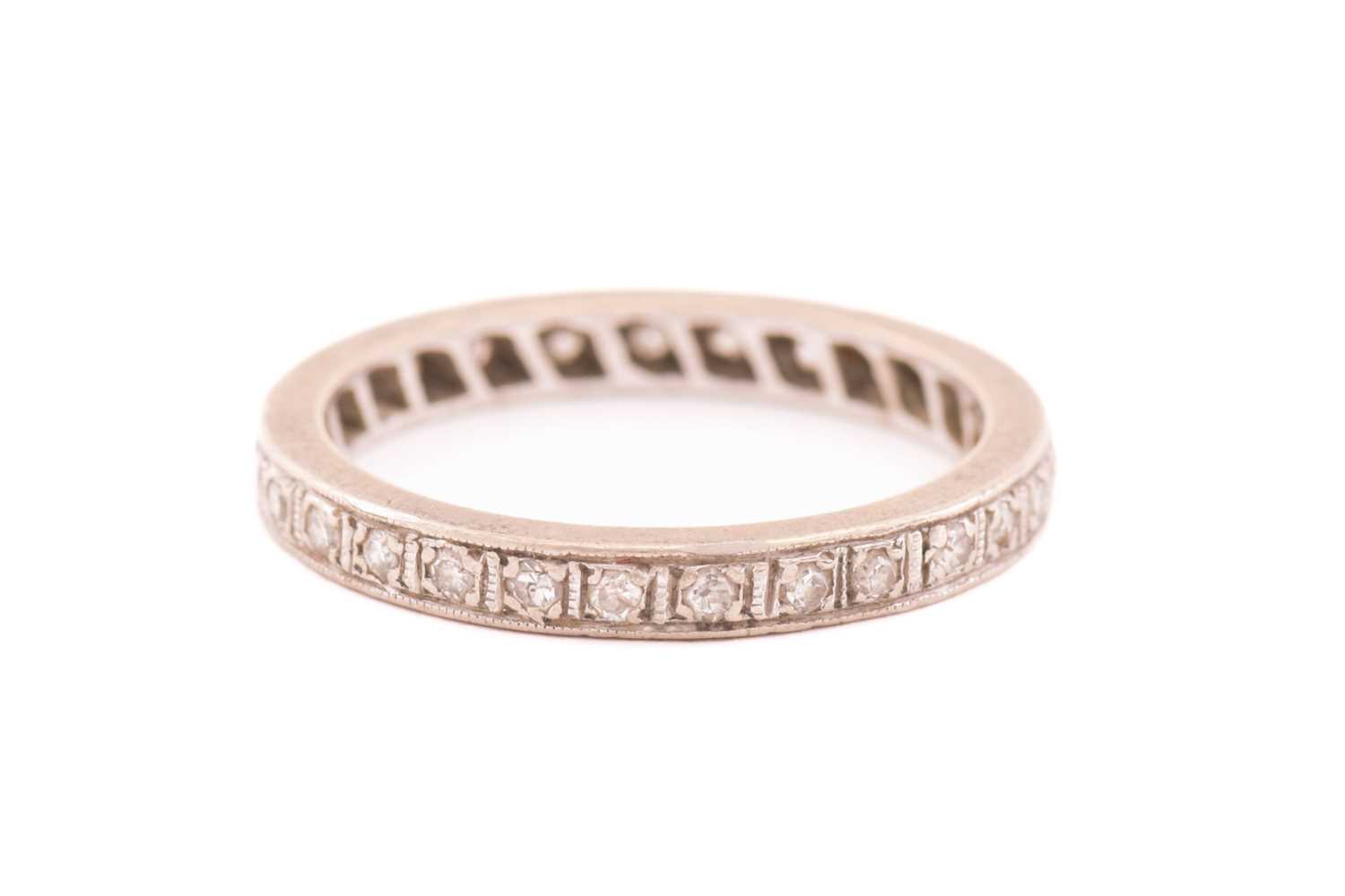 Lot 25 - A diamond eternity ring, fully pavé-set with...