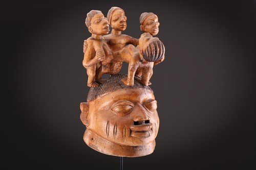 Lot 128 - An erotic Gelede mask, Nigeria, carved with a...