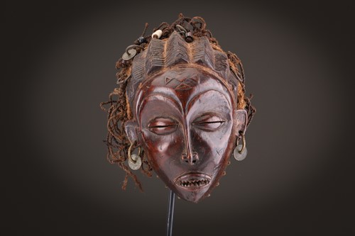 Lot 60 - A Tchokwe Pwo mask, Angola, with sculpted...