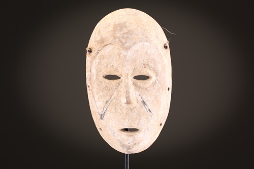 Lot 21 - A Mbole/Yela kela mask, with recessed eye...