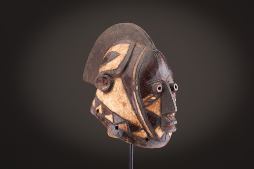 Lot 142 - A Mende helmet mask, Sierra Leone, with linear...