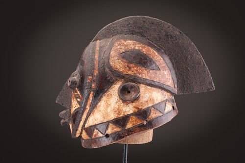 Lot 142 - A Mende helmet mask, Sierra Leone, with linear...