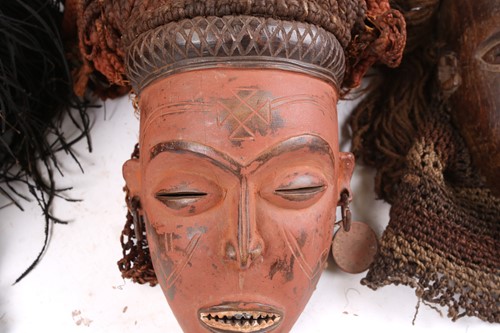 Lot 117 - Four Tchokwe Pwo masks, Angola, the larger...