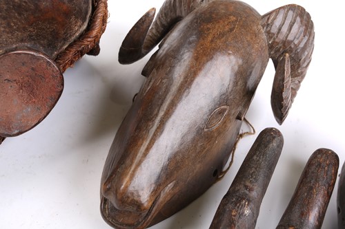 Lot 82 - A collection of zoomorphic masks, to include a...