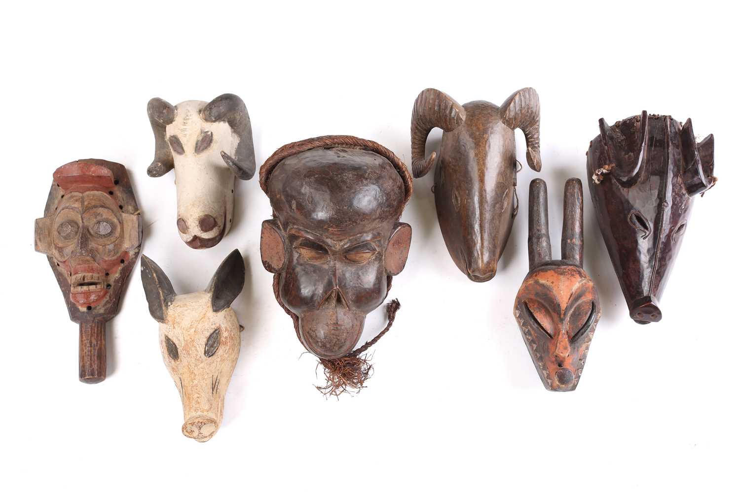 Lot 82 - A collection of zoomorphic masks, to include a...