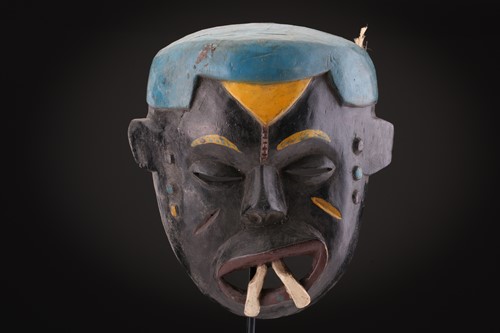 Lot 78 - Two Indonesian sickness type masks, painted in...