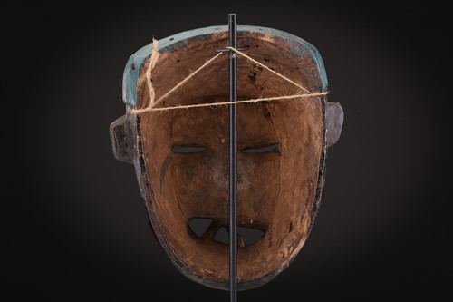Lot 78 - Two Indonesian sickness type masks, painted in...