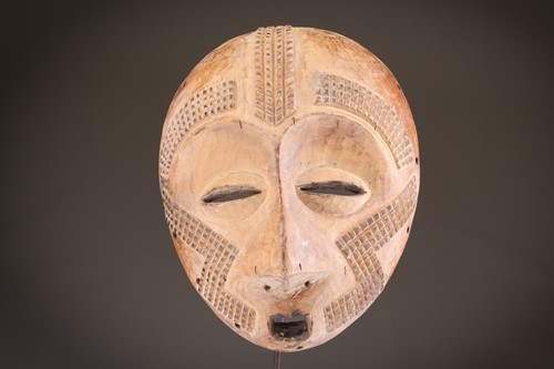 Lot 43 - A Fang Ngil mask, Gabon, the open mouth...