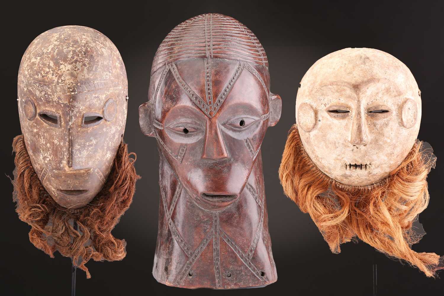Lot 115 - A Tabwa mask, Tanzania, with linear coiffure,...