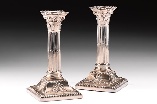 Lot 327 - A pair of Edwardian Neo-Classical four-sconce...