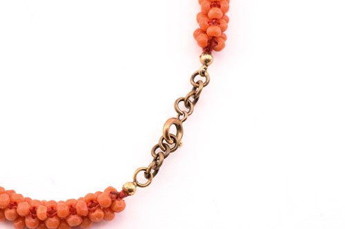 Lot 122 - Three coral beaded necklaces; to include one...