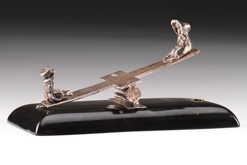 Lot 295 - An Edwardian silver and tortoiseshell desk toy...