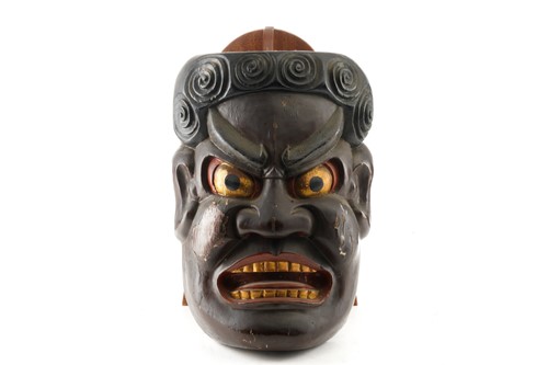 Lot 147 - A collection of four Japanese carved wood...