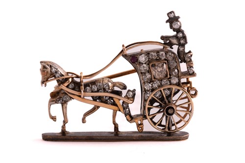 Lot 113 - A horse-drawn carriage brooch set with...