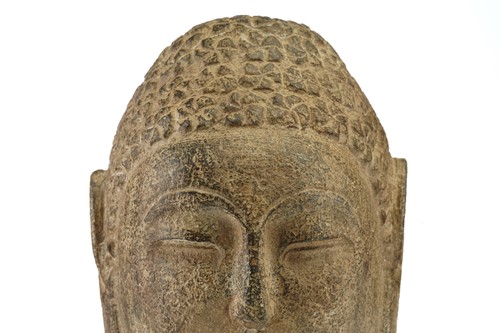 Lot 83 - A Chinese-carved stone head of the Gautama...