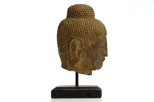 Lot 85 - A Chinese-carved stone head of the Gautama...
