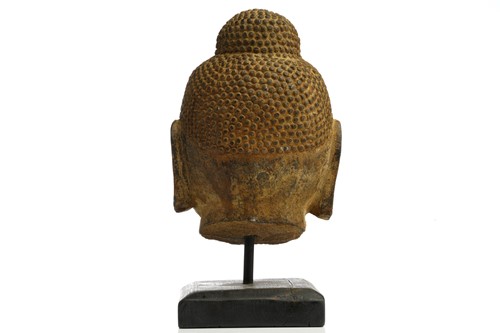 Lot 85 - A Chinese-carved stone head of the Gautama...